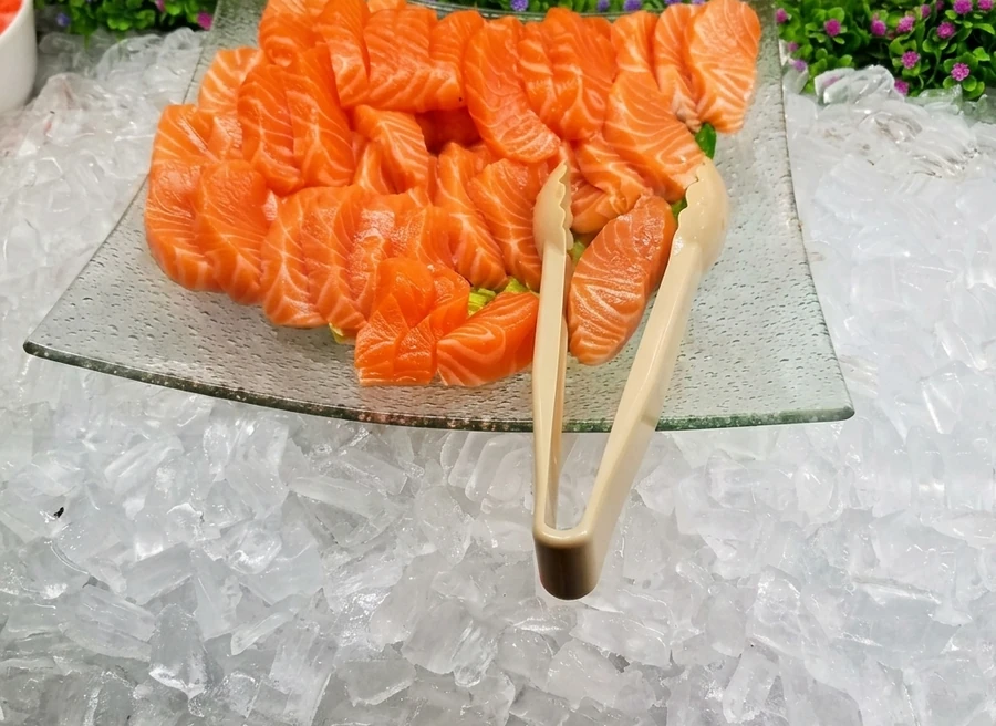 Salmon and tuna sashimi and nigiri on the dinner buffet at A+ Buffet Sushi & Bar on Macleod Trail SE Calgary