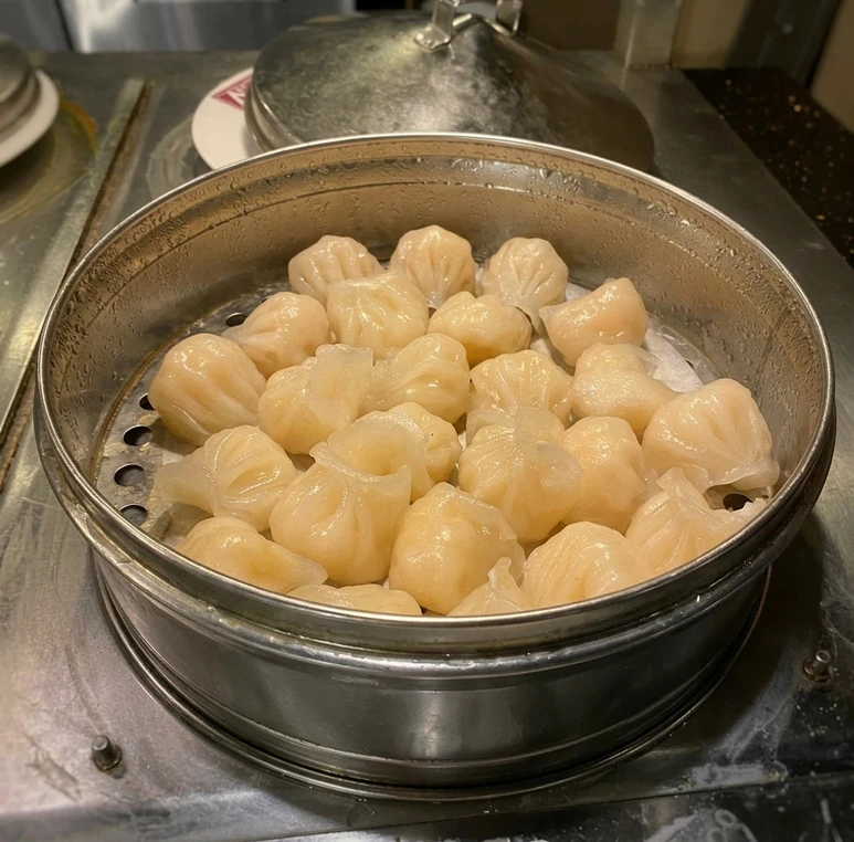 Dim sum-style dumplings and siu mai at A+ Buffet Sushi & Bar near Chinook Centre Calgary